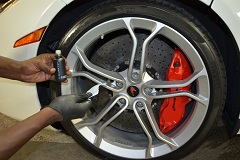 Rim faces cleaned and tires treated with water based, non-sling tire dressing