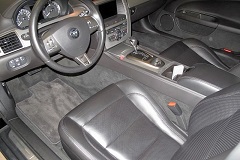 Thorough Wipe-down of dashboard area, cup holders, and doors