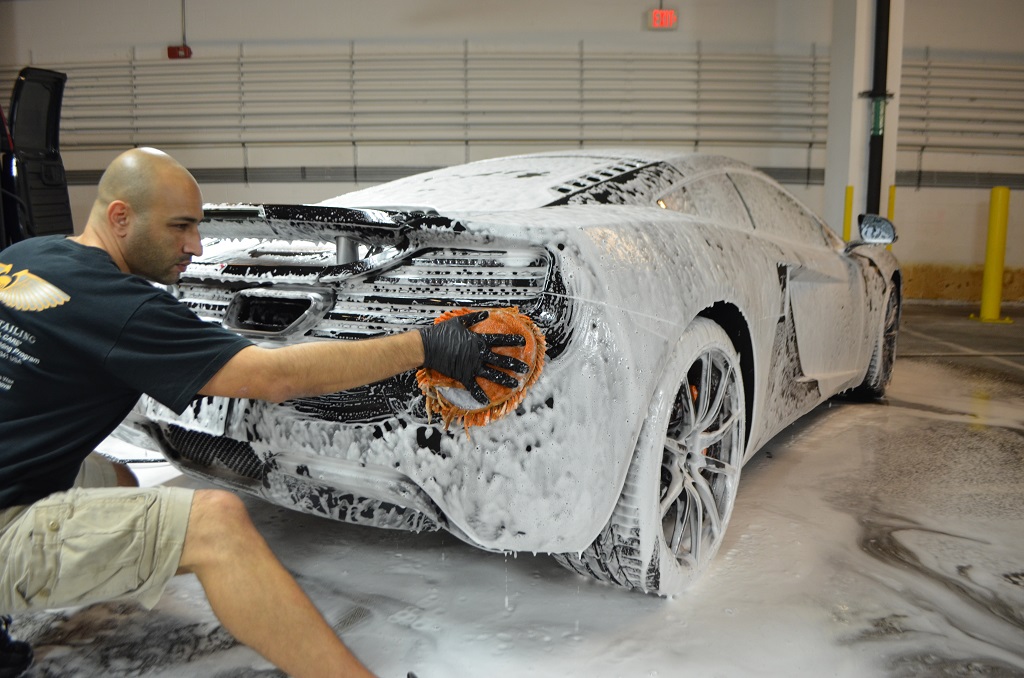 A professional hand wash utilizing Microfiber washing mitts and wheel brushes