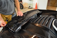 Professional application of computer cut Clear Bra / PPF / Paint Protection Film to desire areas