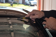 Professional edge cutting and shrinking preparation of the back window film	